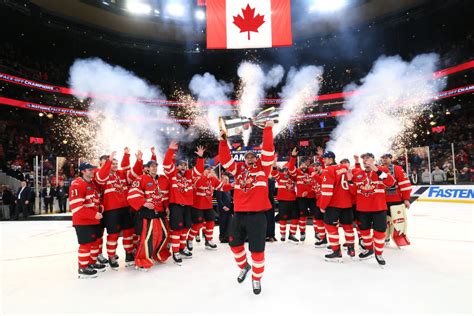 Canadian ice hockey players celebrate victory