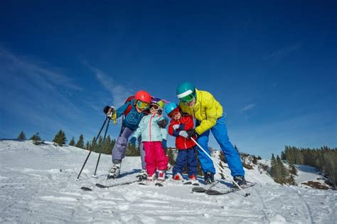 Family skiing on a sunny day