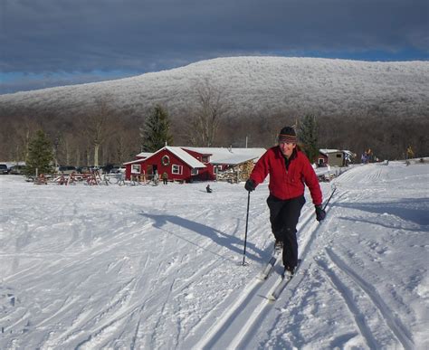 Happy skiers touring on the summit of Bald Knob at White Grass.