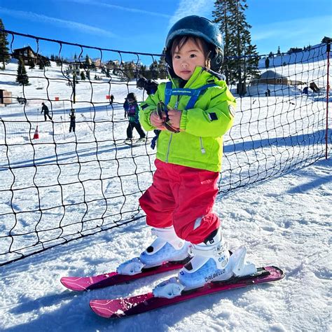 Kid in full ski gear