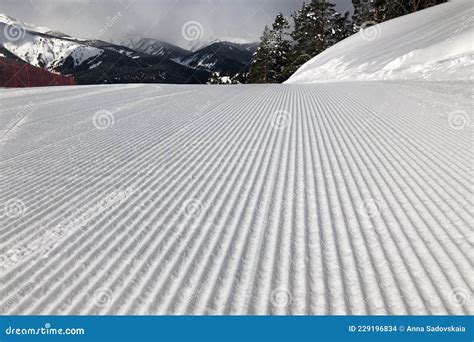 Skiing on a groomed slope