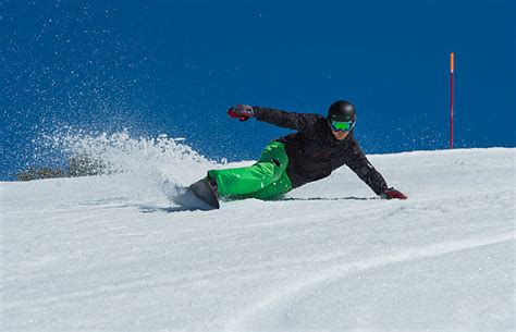 Snowboarder carving