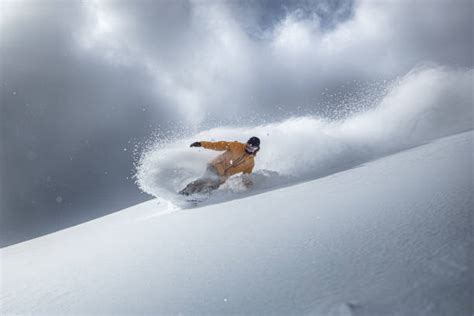 Snowboarder in powder