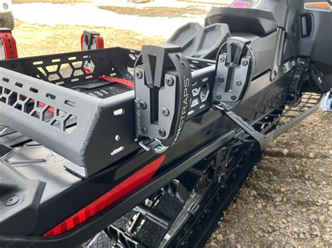 Snowmobile with ski carrier