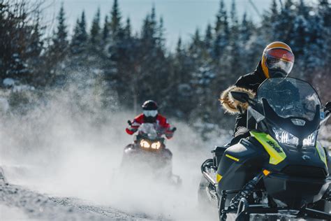 Snowmobilers on a trail