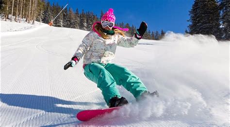 Woman Snowboarding