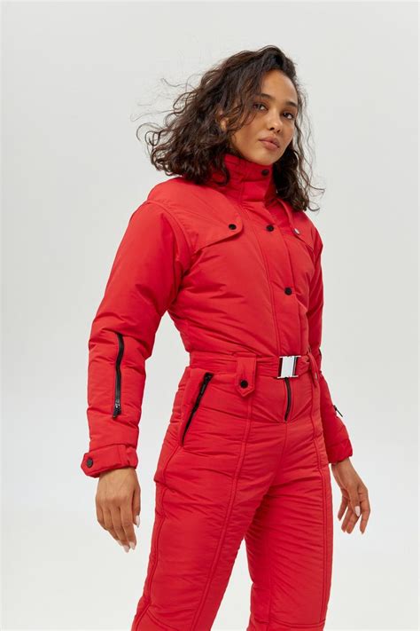 Woman in a red one-piece ski suit